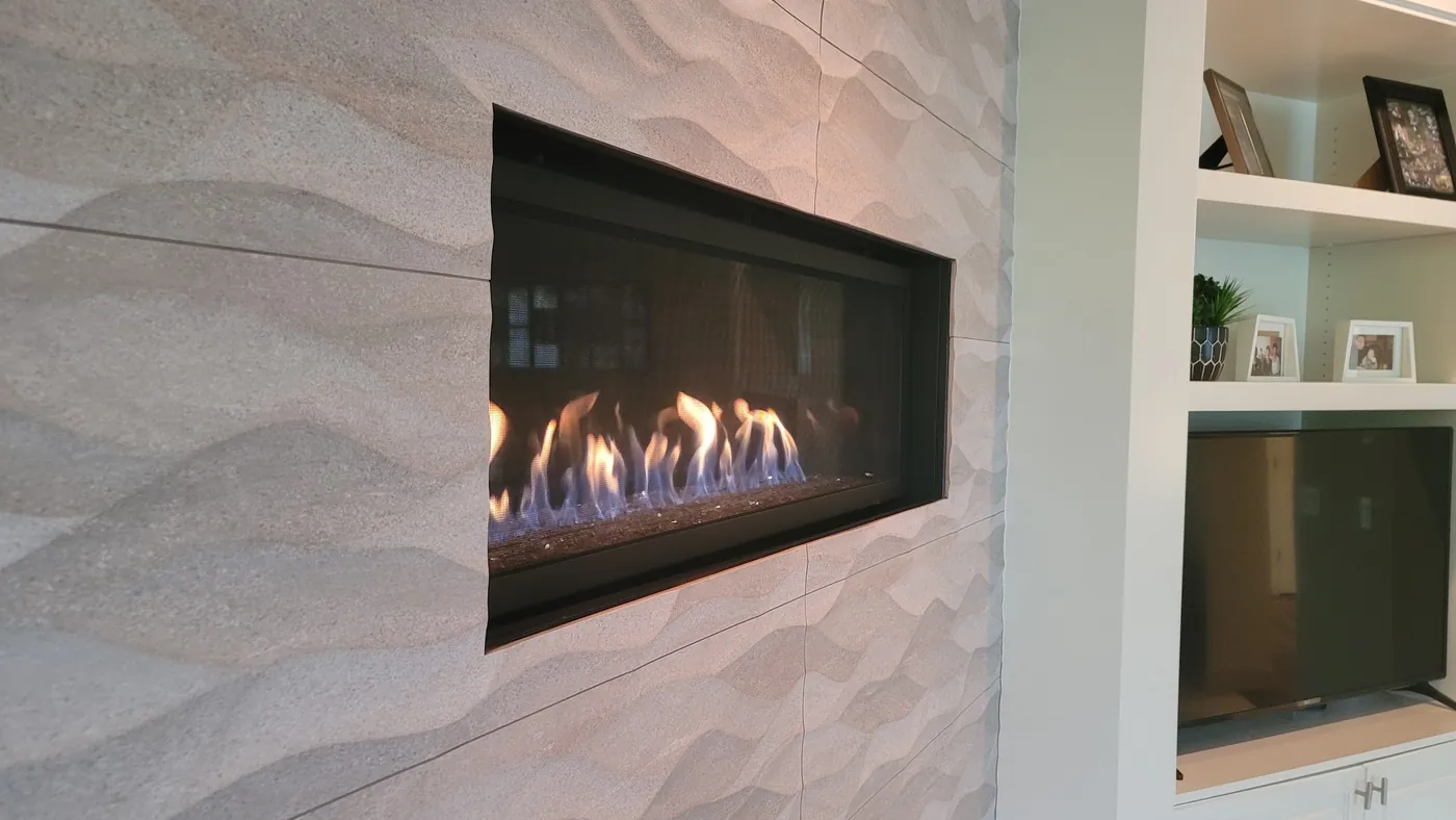 - project image Finished fireplace tile in the living room beside the Redmond kitchen remodel