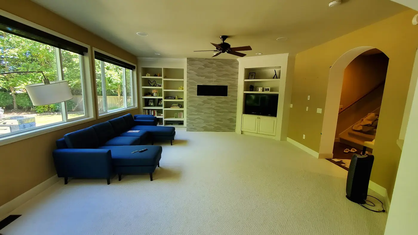 - project image Adjacent living room finish connected to the completed Redmond kitchen