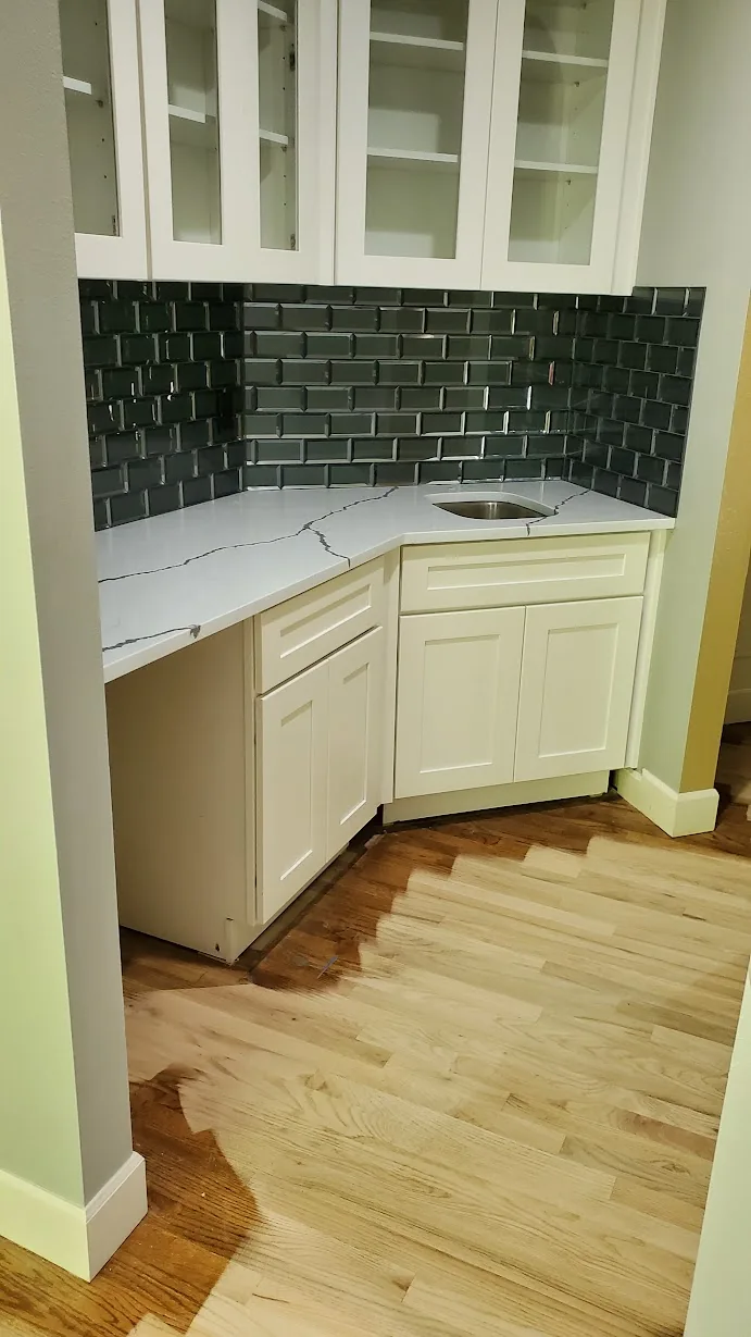 - project image Built-in cabinet niche connected to the Redmond kitchen and entertaining area
