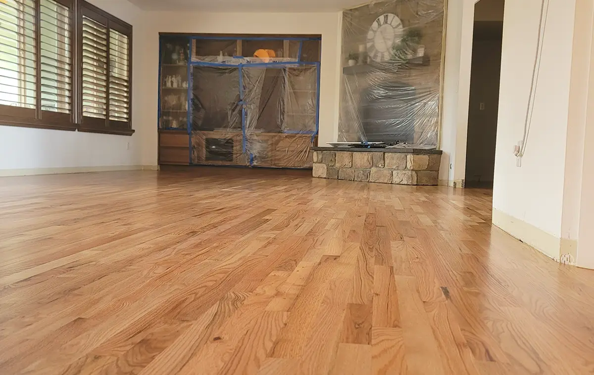 Puyallup hardwood floor restoration completed after water damage affected the kitchen flooring