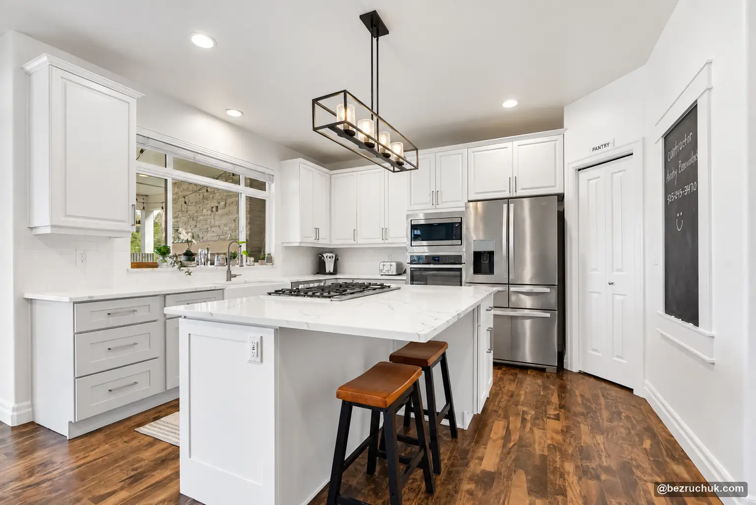 Home renovation project in Duvall WA with a remodeled kitchen, island and built-in appliances