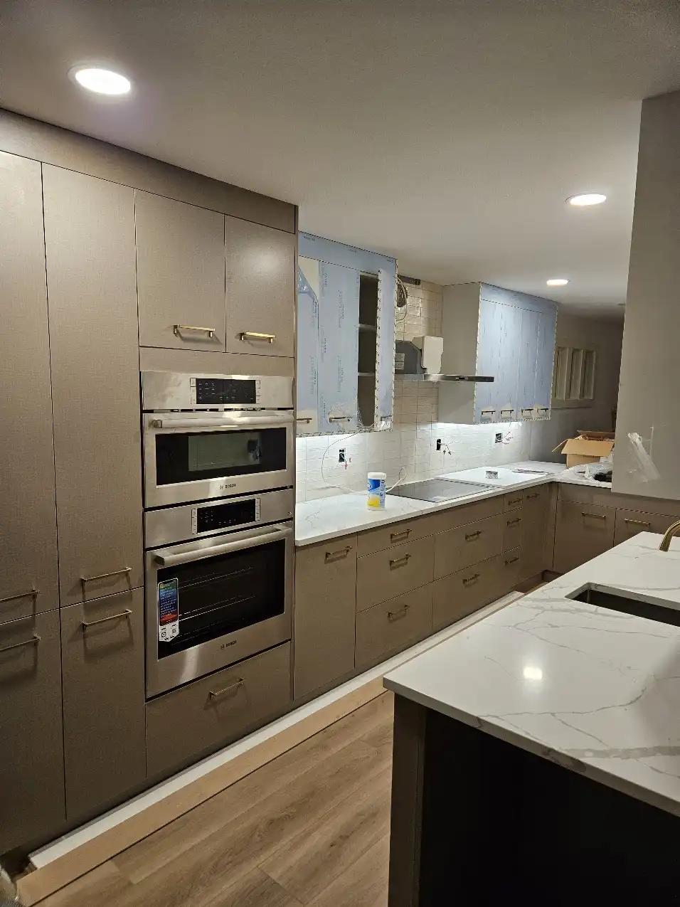 Built-in appliance installation during the Bellevue kitchen remodel