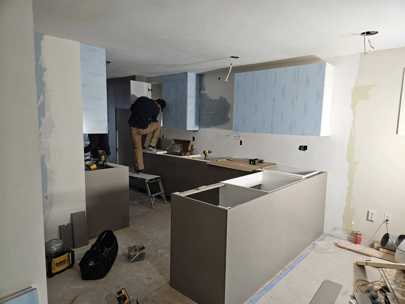 Cabinet installation progress in the Bellevue kitchen remodel