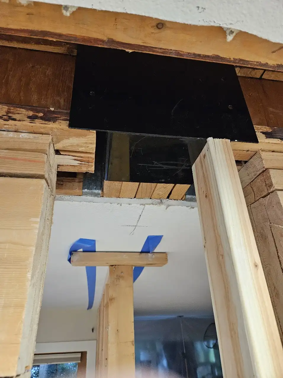 Custom metal bracket at the completed Bellevue wall opening