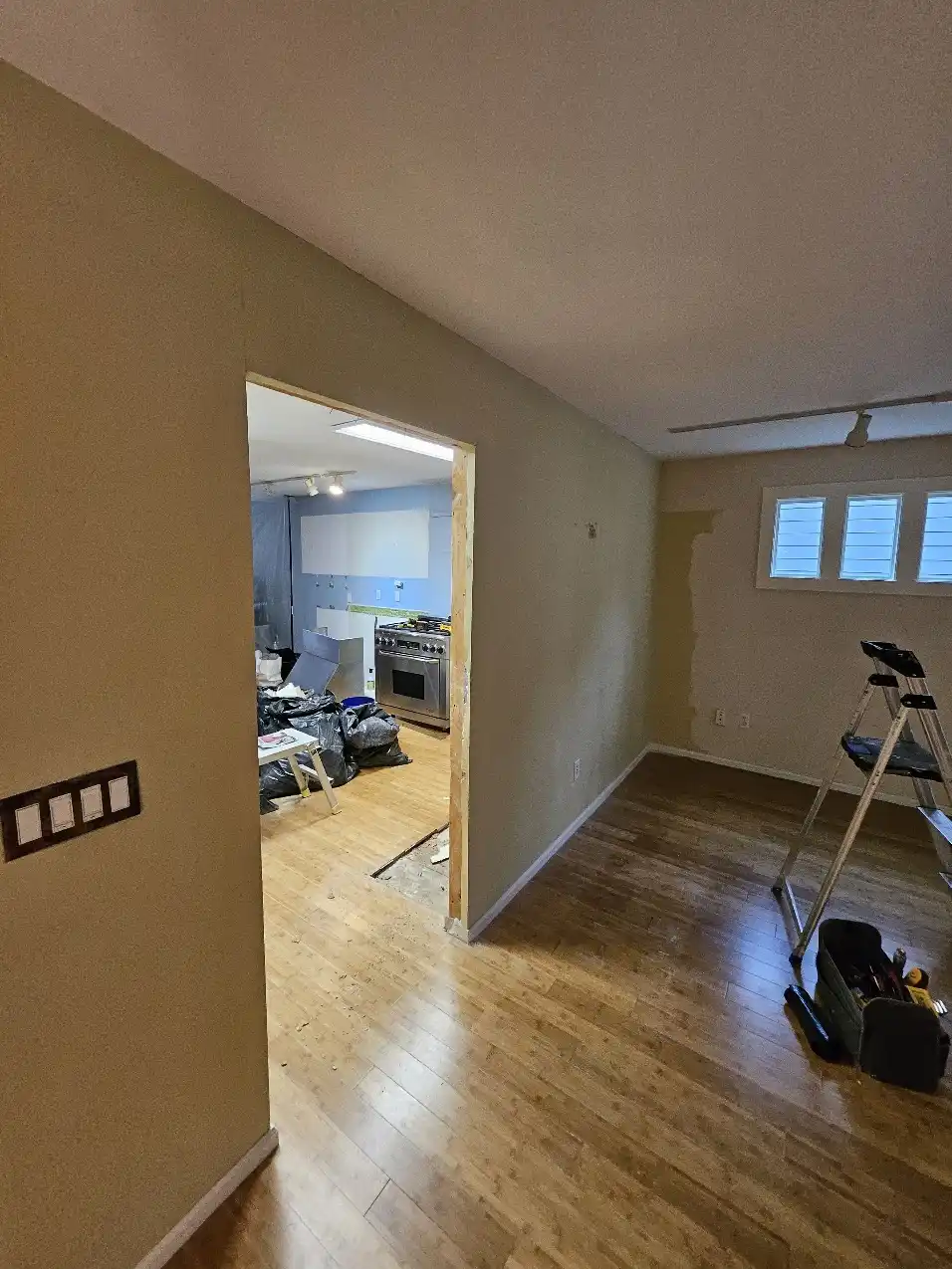 Wall opening progress during the Bellevue kitchen and main-floor remodel