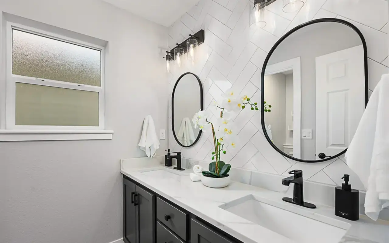 - project image Guest bathroom after full home renovation with modern vanity and tile