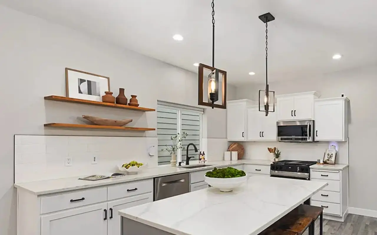 - project image Kitchen after full home renovation with shaker cabinets and quartz countertops