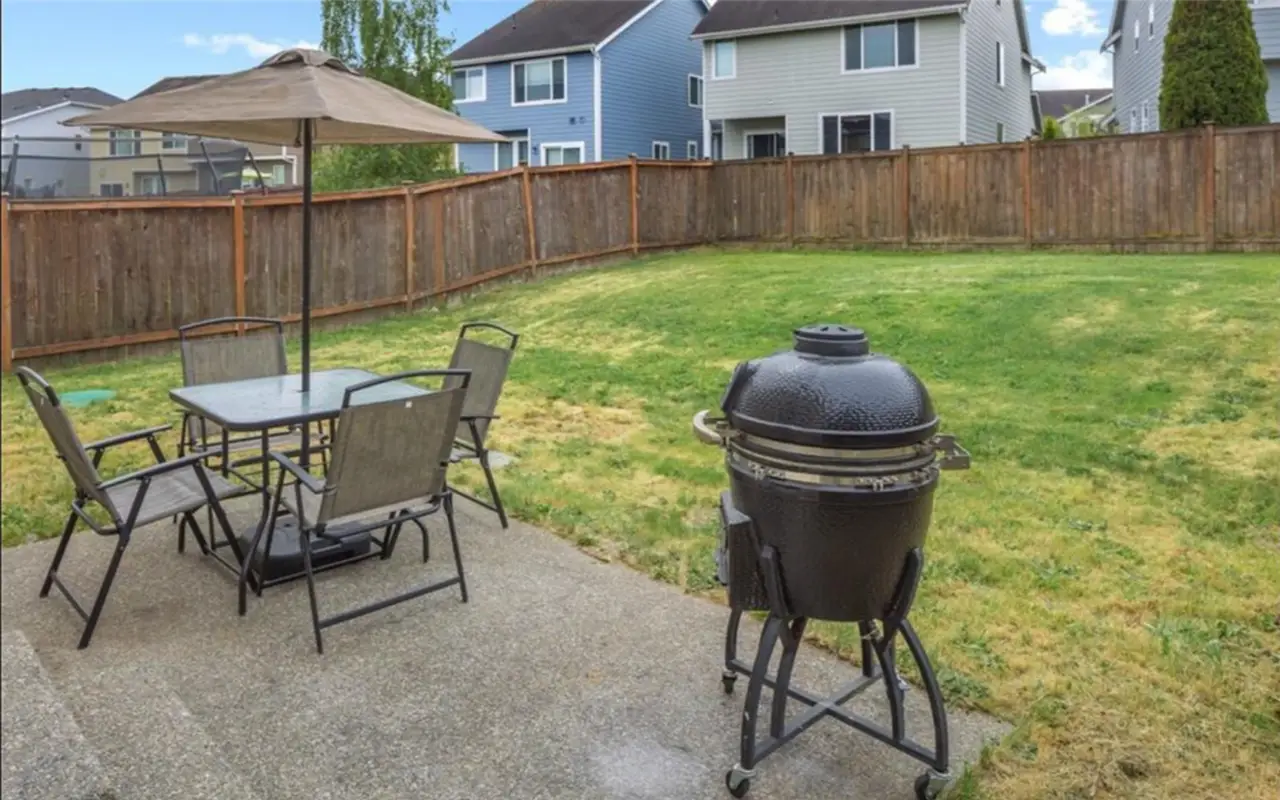 - project image Outdoor patio and backyard before full home renovation