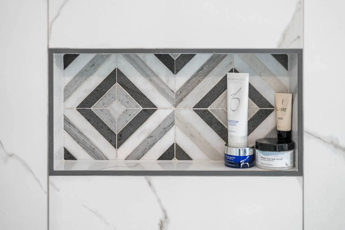 Custom Shower Niche Tile Detail in Puyallup Custom tiled shower niche in Puyallup bathroom remodel with geometric accent tile