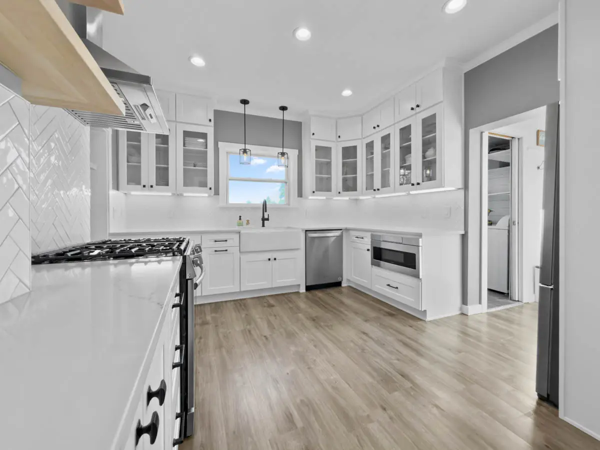 - project image Completed kitchen remodel in Edgewood WA with white shaker cabinets and improved lighting