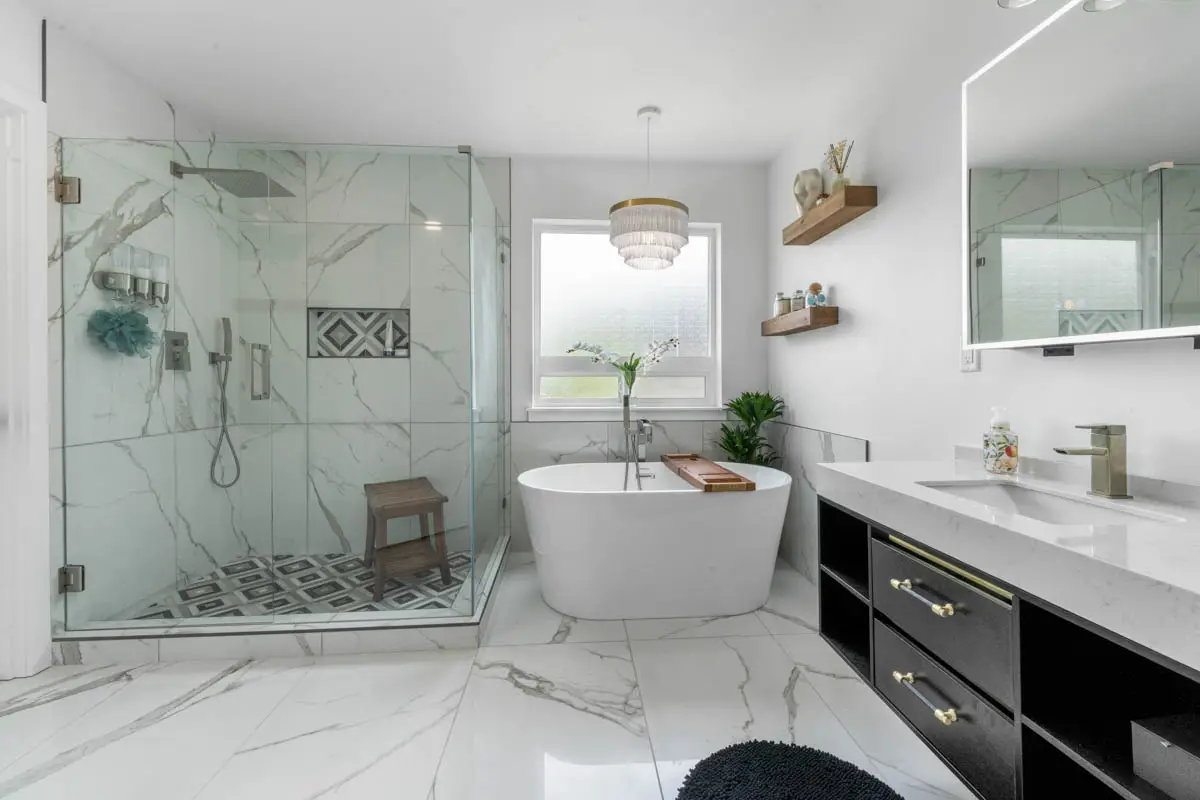 - project image Finished bathroom remodel in Puyallup with freestanding tub, Schluter waterproofed shower, and modern tile design