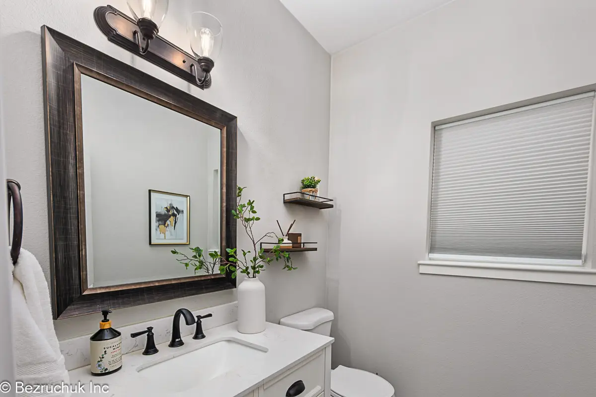- project image Powder room updated during a bathroom remodel before and after full home renovation