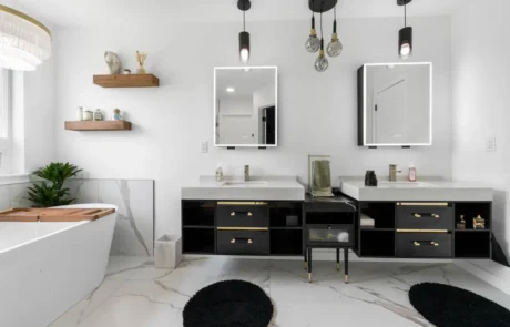 Double Vanity in Modern Puyallup Bathroom Remodel Double vanity with backlit mirrors in a modern Puyallup bathroom remodel