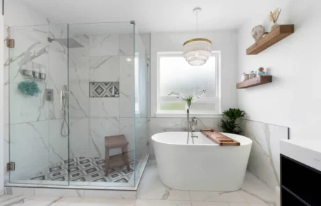 freestanding-tub-window-feature.webp Freestanding bathtub positioned beneath a window with natural light