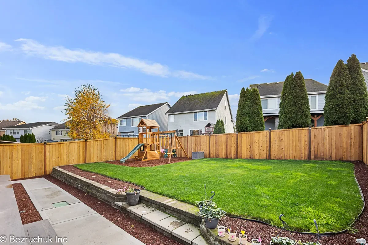 Akron Home Renovation Backyard Fence and Landscaping Example Backyard renovation example with new fencing, landscaping, and outdoor living improvements