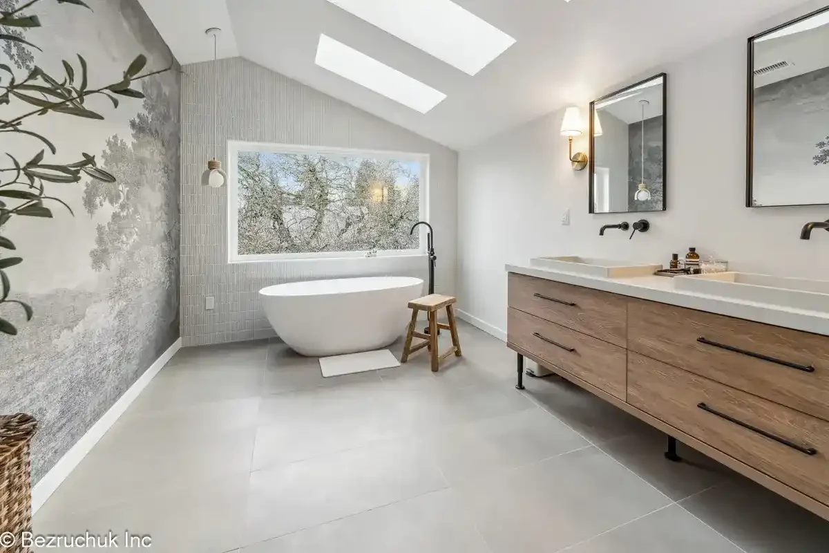 Akron Home Renovation Bathroom Skylight and Mural Example Finished bathroom renovation example with skylights, wall mural, tile floor, and modern vanity