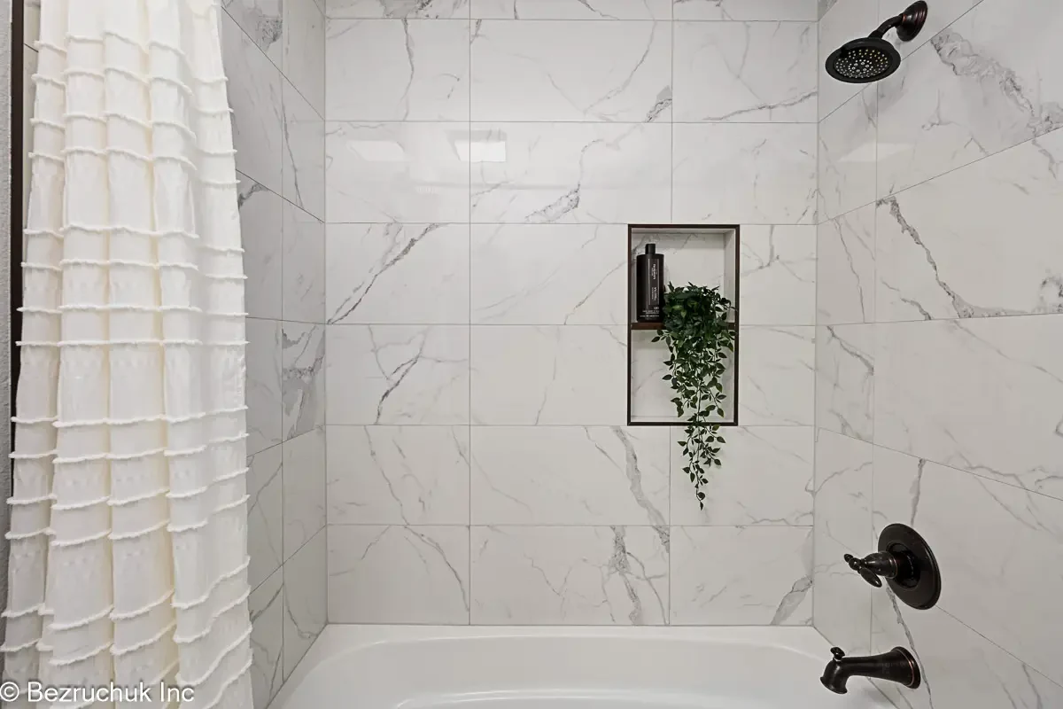 Akron Home Renovation Tub Shower Combo Example Bathroom renovation example with tub shower combo, tile surround, and updated fixtures