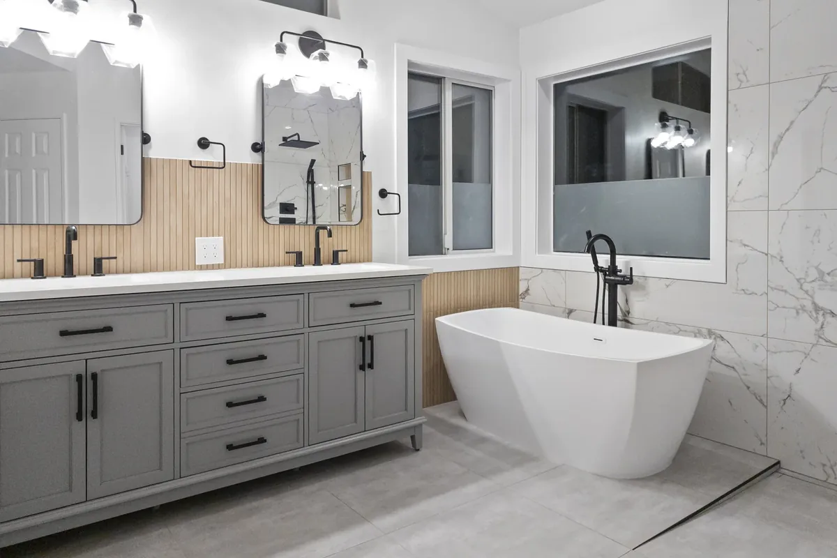 After Akron Bathroom Remodel – Double Vanity and Freestanding Tub After photo of Akron bathroom remodel with double vanity and freestanding tub