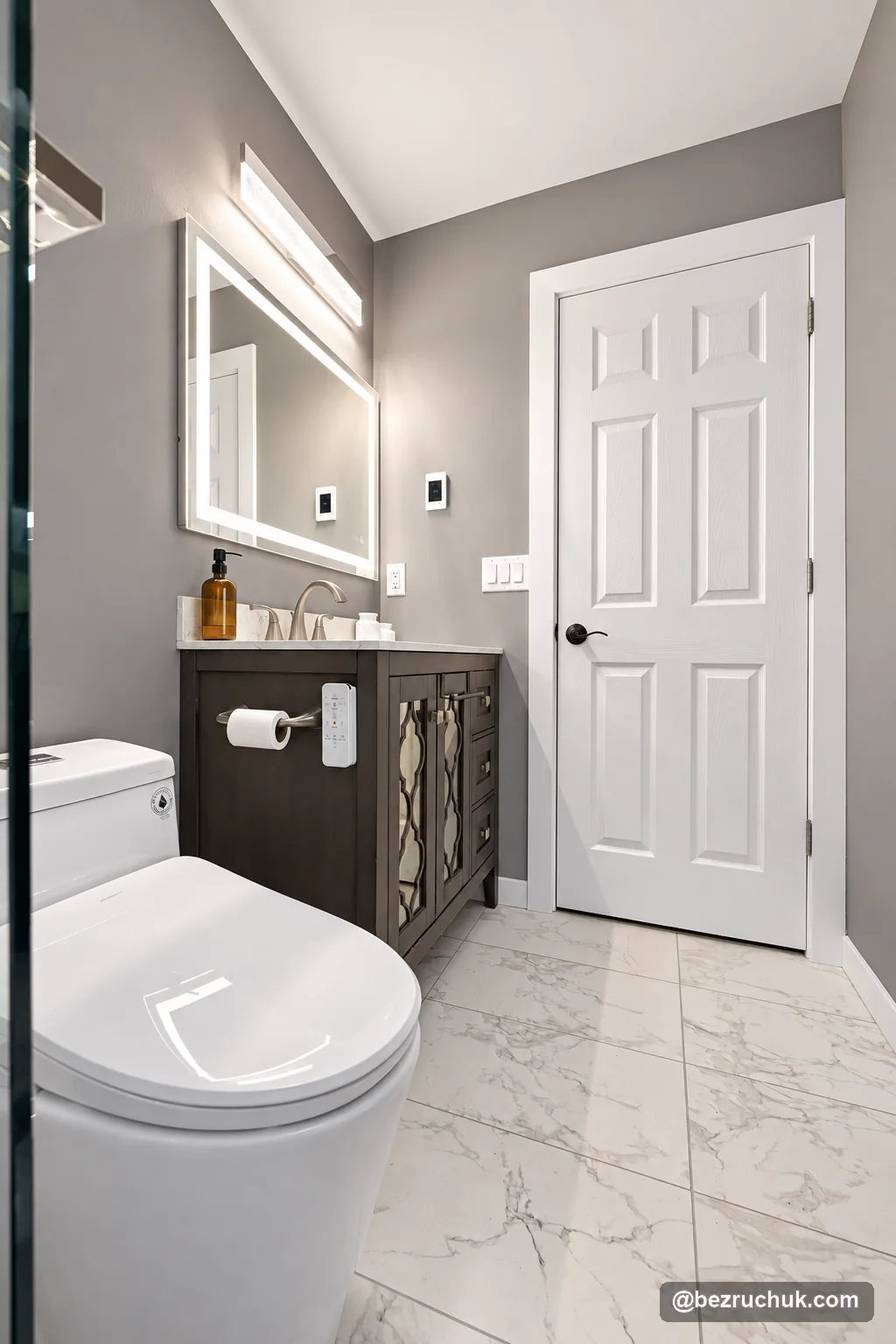 - project image Retained dark bathroom vanity and entry door beside the new tile floor