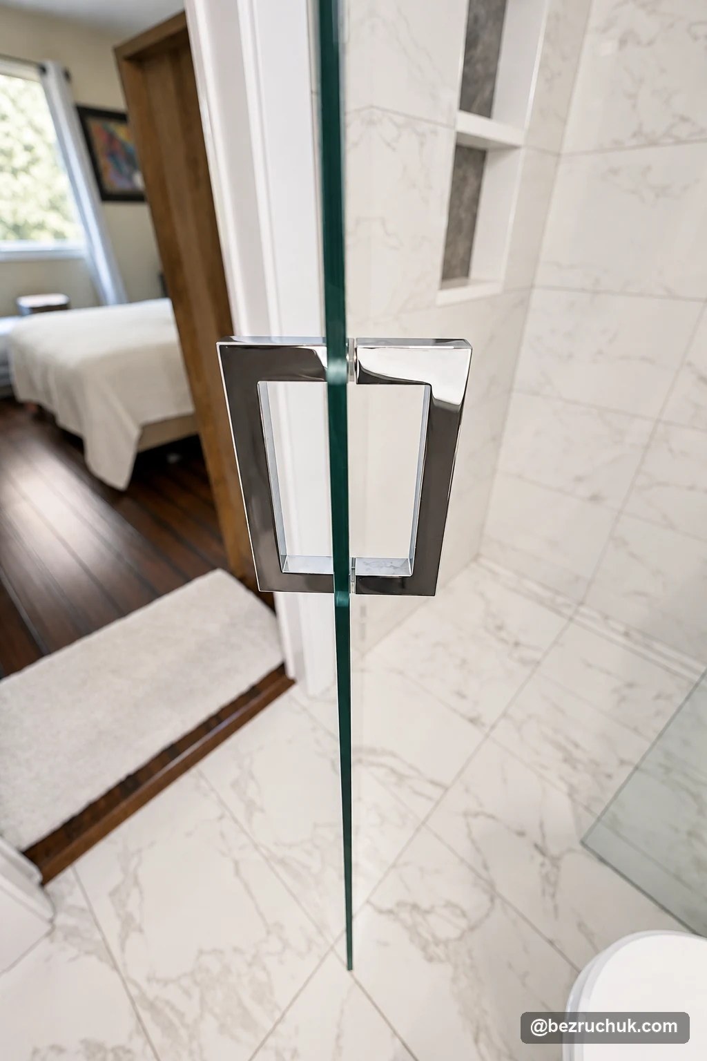 - project image Metal handle on the frameless glass shower door