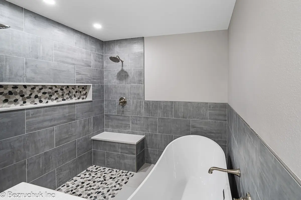 - project image Bathroom layout remodel in Graham with a curbless shower, bench and freestanding tub