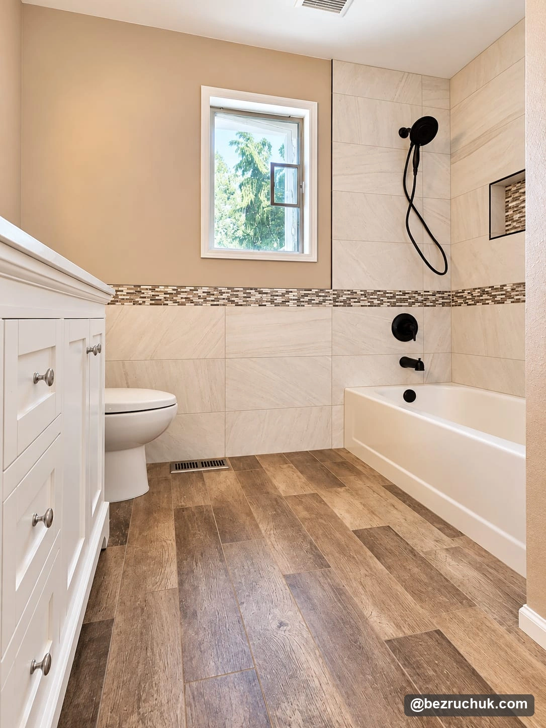 Finished Klahanie guest bathroom in Issaquah WA showing the tub shower, toilet, vanity and wood look floor