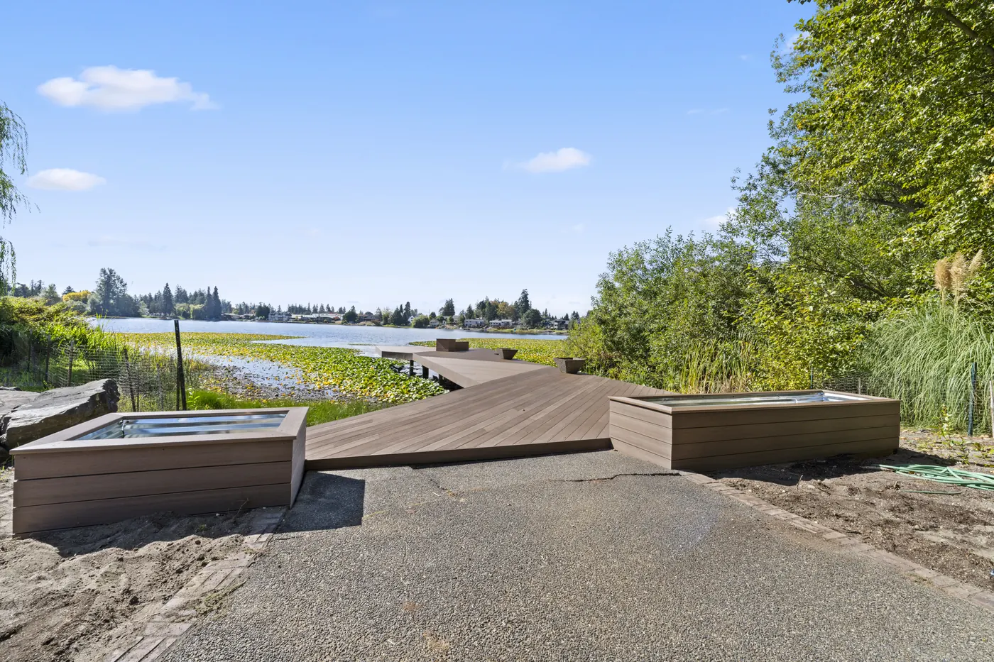 - project image The new AZEK dock extending from the Edgewood shoreline over the water.